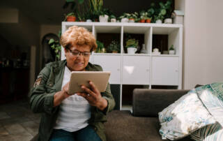 Adult holding a tablet